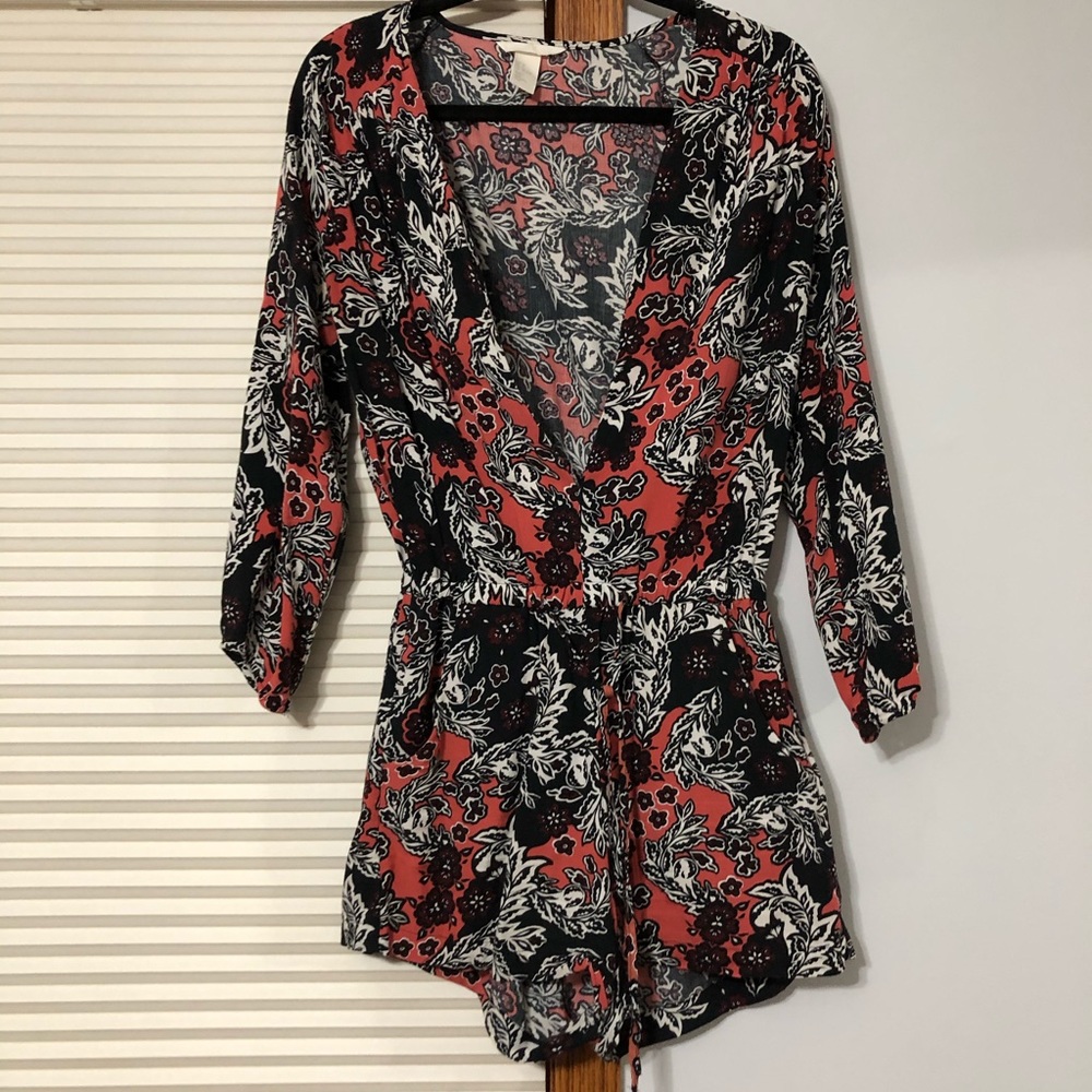 black and orange romper with pockets